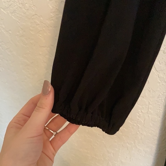 Norma Kamali black long sleeve dress with cutout neckline design. - Picture 7 of 9